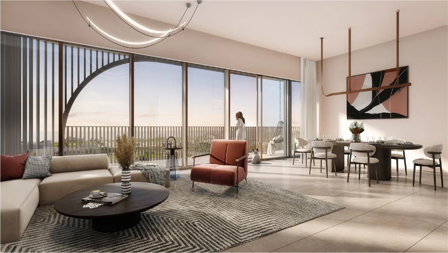 Stylish living room with large windows and city views in Manarat Living apartment
